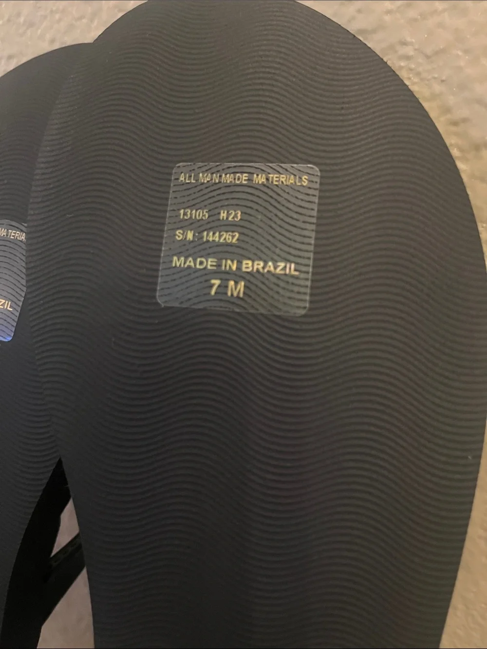 Tory Burch Black Quilted Flip Flops with Gold Logo Accent